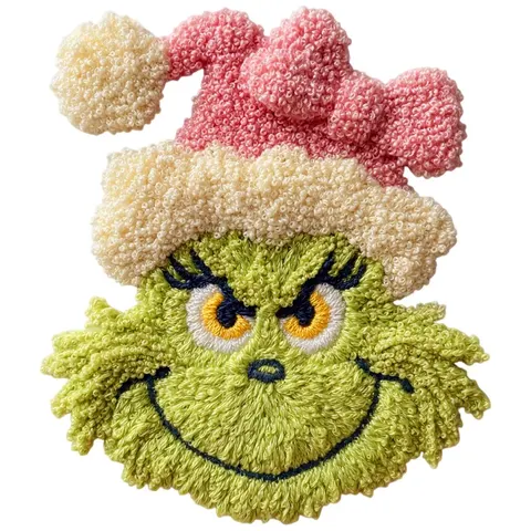 Diseño DTF del Grinch con gorro rosa